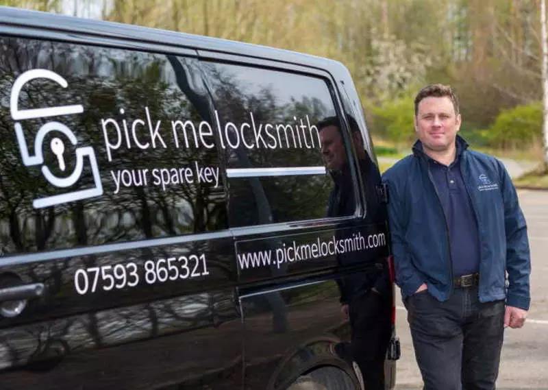 Mark, Master Locksmith, standing by his van in the Burton on Trent countryside
